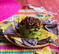 Cricket topped guacamole recipe | BBC Good Food image