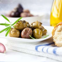 Spanish Cracked Marinated Olives - BigOven image