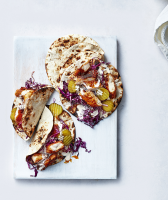 Hot Chicken Tacos With White Sauce Slaw Recipe | Real Simple image