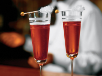 Pomegranate Champagne Cocktail Recipe | MyRecipes image