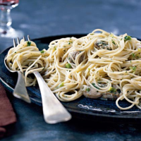 Oysters over Angel Hair Recipe | MyRecipes image