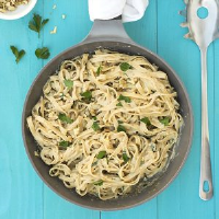 Black garlic creamy linguini pasta with olive oil béchamel image