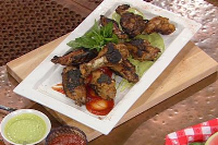 Beer-Brined Grilled Turkey Wings Recipe | Cooking Channel image