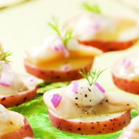 Scandinavian Pickled Herring Bites Recipe | EatingWell image