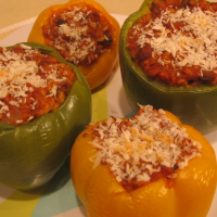 Stuffed Peppers with Ground Beef and Rice Recipe | MyRecipes image