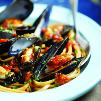 Italian Mussels & Pasta Recipe | EatingWell image