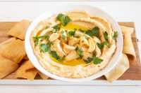 Roasted Garlic Hummus Recipe | EatingWell image