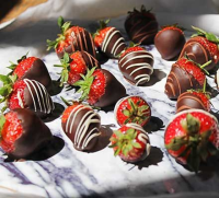 Chocolate-dipped strawberries recipe | BBC Good Food image