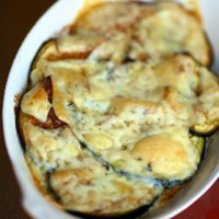 Baked Eggplant with Garlic and Cheese Recipe | Allrecipes image