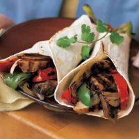 Beef-&-Chicken Fajitas with Peppers & Onions Recipe ... image