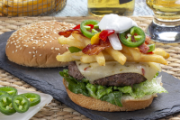 Nacho Fries Topped Cheeseburger | MrFood.com image