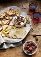 Baked Brie with Pecans Recipe | Southern Living image