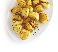 Spicy roast potatoes recipe | BBC Good Food image
