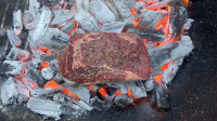 Caveman Ribeye Steak Cooked Directly on the Coals - Smoked ... image