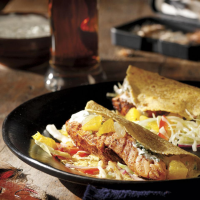 Grilled Salmon Soft Tacos Recipe | EatingWell image