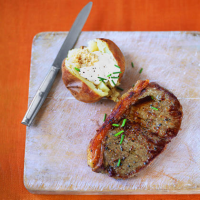 Sirloin Steak and Baked Potatoes Recipe | MyRecipes image
