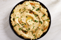 Best Garlic Mashed Potatoes Recipe - Creamy ... - Delish image