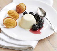 Lemon panna cotta with blackberries & honey madelei… image