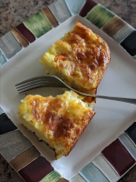 Cheesy Baked Eggs | Allrecipes image