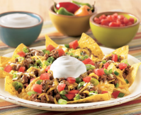 Loaded Beef Nachos Recipe with Sour Cream - Daisy Brand image