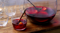 Mulled wine with sloe gin recipe - BBC Food image