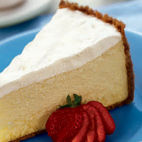 Sour Cream Cheesecake Recipe | MyRecipes image