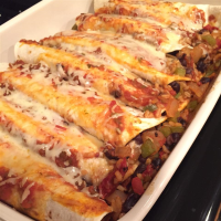 Black Bean and Rice Enchiladas Recipe | Allrecipes image