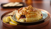 Brie in Puff Pastry with Cranberry Sauce - BettyCrock… image