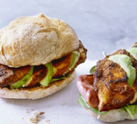 Fully loaded Cajun chicken burgers recipe | BBC Good Food image