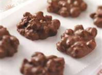 Easy Peanut Clusters | Just A Pinch Recipes image