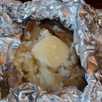Campfire Baked Potatoes Recipe | Allrecipes image