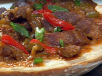 Onion and Pepper Smothered Round Steak Recipe | Food Network image