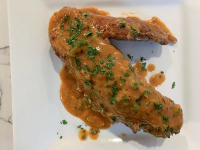 Smothered Turkey Wings Recipe | Eddie Jackson | Food Network image