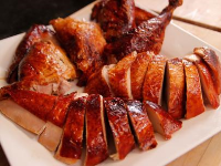 How to Smoke a Turkey on a Grill | Smoked Whole Turkey ... image