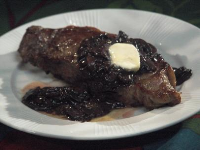 Smothered Turkey Wings Recipe | Eddie Jackson | Food Network image
