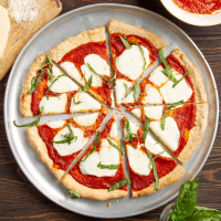 Gluten-Free Pizza Crust Recipe: How to Make It - Taste of Home image