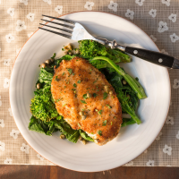 Chicken Scaloppine over Broccoli Rabe Recipe | MyRecipes image
