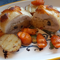 Stuffed Chicken Thighs with Roasted Potatoes and Carrots ... image
