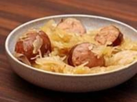 Polish Sausage with Sauerkraut - Just A Pinch Recipes image