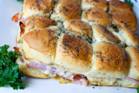 Hawaiian Roll Ham Sliders - Just A Pinch Recipes image