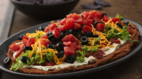 Mexican Layer Dip Recipe: How to Make It - Taste of Home image
