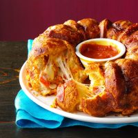 Pizza Monkey Bread Recipe: How to Make It - Taste of Home image