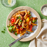 Spicy Chicken Pasta with Peppers & Onions Recipe | Eati… image