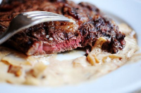 Grilled Ribeye Steak with Onion-Blue Cheese Sauce image