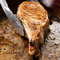 Pan-Seared Thick-Cut, Bone-In Pork Chops for Two | Cook's ... image