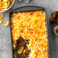 Mexican Layer Dip Recipe: How to Make It - Taste of Home image