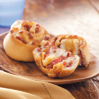 Pizza Pinwheels Recipe: How to Make It - Taste of Home image