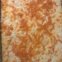 Cheesy Baked Grits Recipe | Allrecipes image