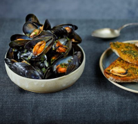 Mussels in white wine sauce with garlic ... - BBC Good Food image