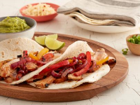 Tex-Mex Pork Fajitas with Peppers and Onions - Food Ne… image